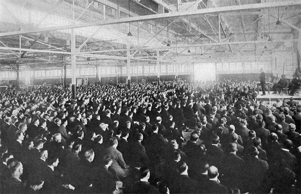 Enthusiasm Arousing Meeting of Airplane Workers in the Heat of War's Fever